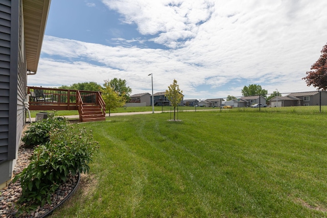 3900 Orchardview Ln NW, Rochester, MN 55901 - view of yard with a wooden deck and a residential view