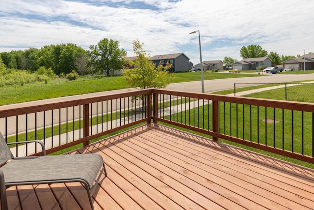 3900 Orchardview Ln NW, Rochester, MN 55901 - wooden terrace featuring a residential view and a lawn