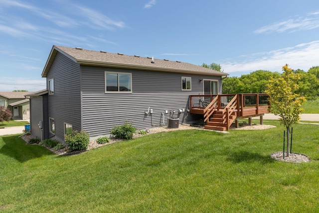 3900 Orchardview Ln NW, Rochester, MN 55901 - back of house featuring a deck, central AC, and a yard