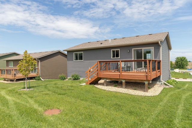 3900 Orchardview Ln NW, Rochester, MN 55901 - rear view of property featuring a deck and a lawn