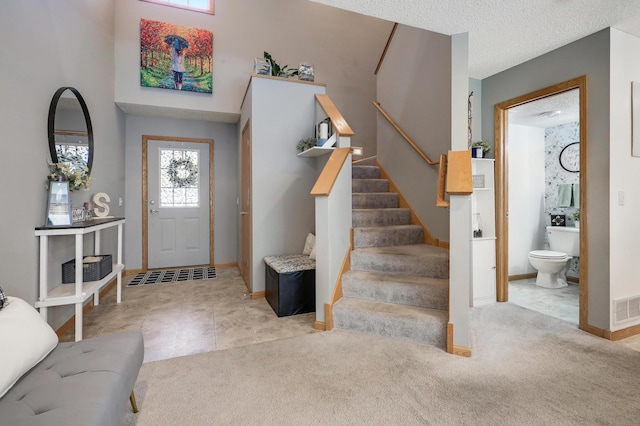 1704 Talon Trl, Eagan, MN 55122 - foyer with stairway, baseboards, and carpet flooring