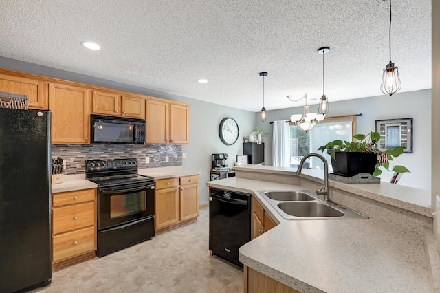 1704 Talon Trl, Eagan, MN 55122 - kitchen with black appliances, a sink, light countertops, decorative backsplash, and a textured ceiling