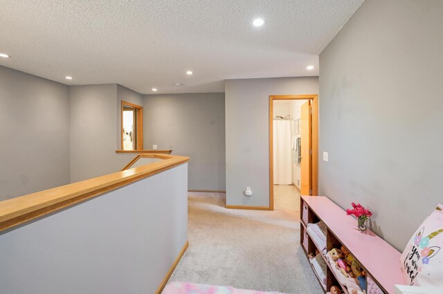 1704 Talon Trl, Eagan, MN 55122 - corridor featuring recessed lighting, light carpet, a textured ceiling, an upstairs landing, and baseboards