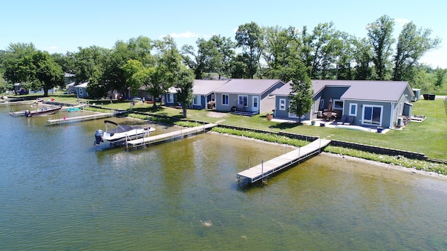 27096 Little Floyd Lake Rd Unit 2, Detroit Twp, MN 56501 - dock with a water view and a lawn