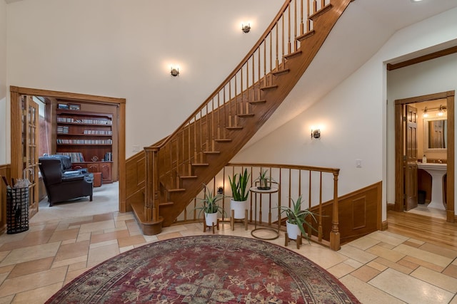 17 Oriole Pl, North Mankato, MN 56003 - stairs featuring stone tile floors and a high ceiling