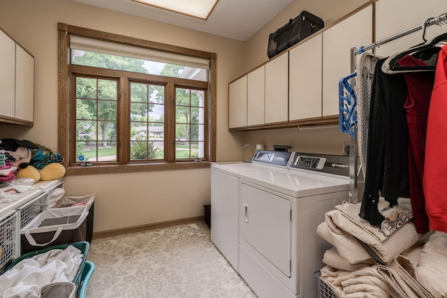 17 Oriole Pl, North Mankato, MN 56003 - washroom featuring cabinet space, independent washer and dryer, and baseboards