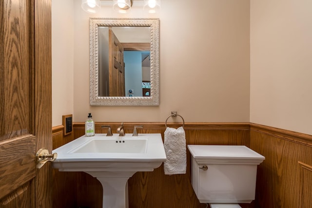 17 Oriole Pl, North Mankato, MN 56003 - half bathroom featuring wainscoting and toilet
