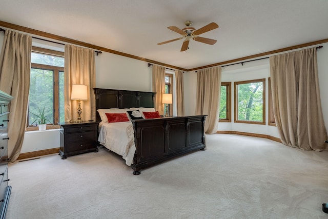 17 Oriole Pl, North Mankato, MN 56003 - bedroom featuring baseboards, light colored carpet, ornamental molding, and ceiling fan