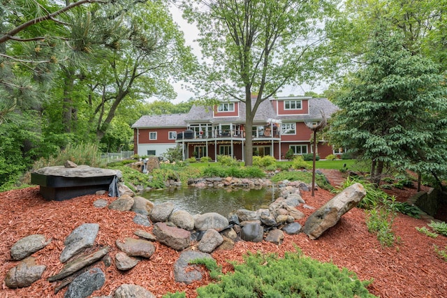 17 Oriole Pl, North Mankato, MN 56003 - rear view of property with a small pond