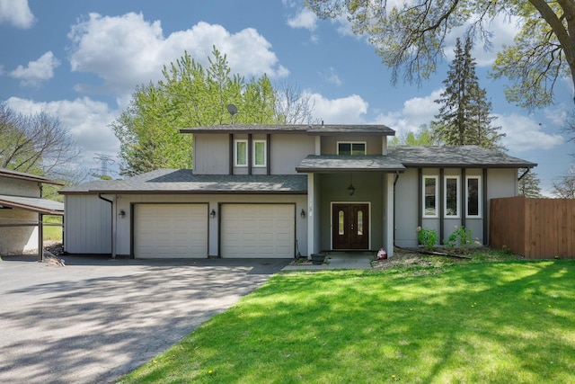 1158 Rockstone Ln, New Brighton, MN 55112 - view of front facade featuring french doors, driveway, and a garage
