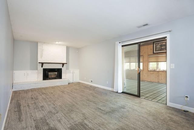 1158 Rockstone Ln, New Brighton, MN 55112 - unfurnished living room with carpet, a fireplace, and baseboards