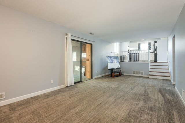 1158 Rockstone Ln, New Brighton, MN 55112 - empty room featuring carpet flooring, baseboards, and stairs