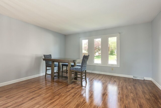 1158 Rockstone Ln, New Brighton, MN 55112 - dining area with baseboards and wood finished floors