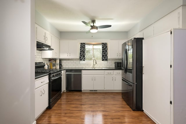 1158 Rockstone Ln, New Brighton, MN 55112 - kitchen with stainless steel appliances, dark countertops, a sink, ceiling fan, and backsplash