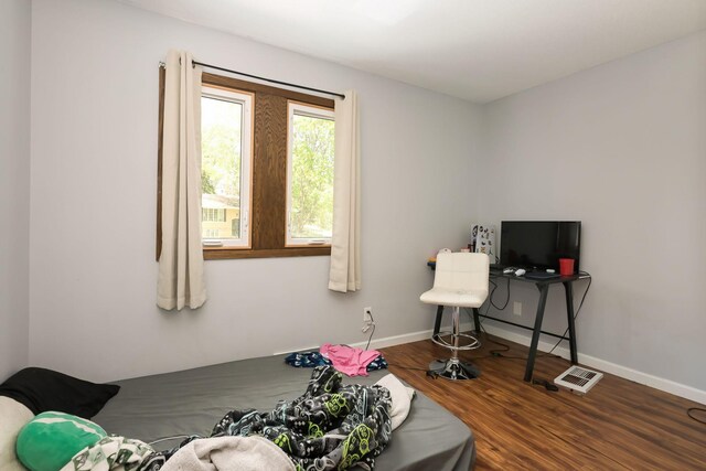 1158 Rockstone Ln, New Brighton, MN 55112 - bedroom with wood finished floors and baseboards