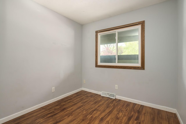 1158 Rockstone Ln, New Brighton, MN 55112 - empty room with baseboards and dark wood-style floors