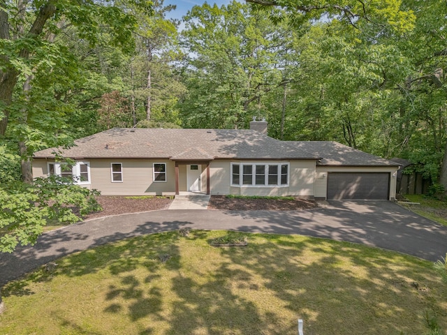 11600 Timberline Rd, Minnetonka, MN 55305 - single story home featuring driveway, a garage, a chimney, and a front lawn