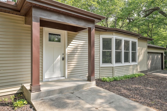 11600 Timberline Rd, Minnetonka, MN 55305 - doorway to property with a garage and driveway