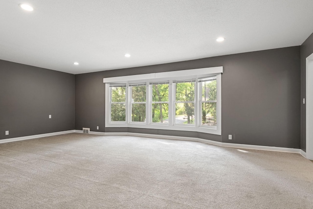 11600 Timberline Rd, Minnetonka, MN 55305 - carpeted empty room featuring recessed lighting and baseboards