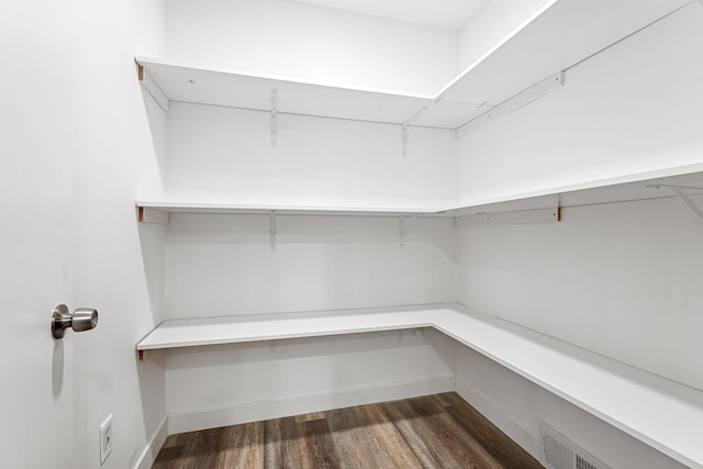 11600 Timberline Rd, Minnetonka, MN 55305 - spacious closet featuring dark wood-style flooring
