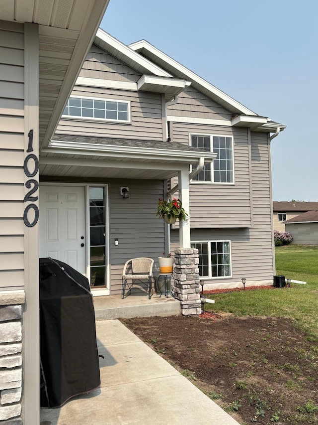 1020 7th Ave NW, Rice, MN 56367 - back of property featuring a porch