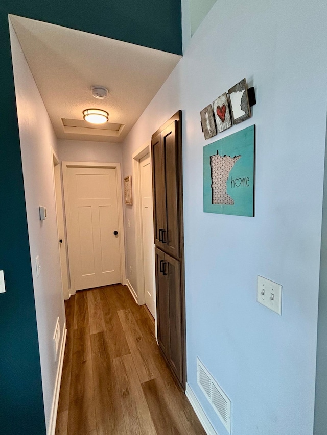 1020 7th Ave NW, Rice, MN 56367 - hall with dark wood finished floors and baseboards