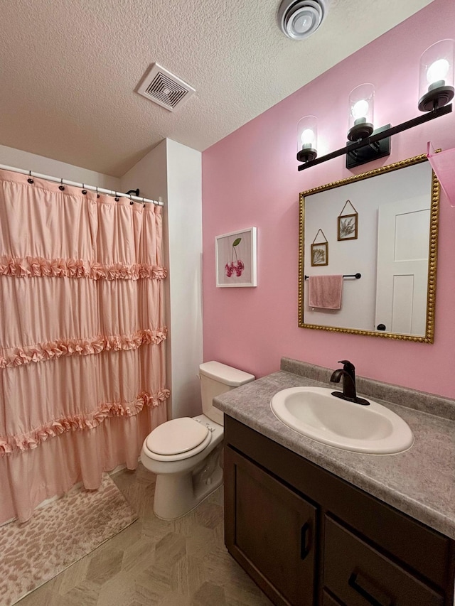 1020 7th Ave NW, Rice, MN 56367 - bathroom with vanity, toilet, a textured ceiling, and a shower with shower curtain