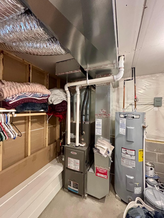 1020 7th Ave NW, Rice, MN 56367 - utility room featuring water heater and heating unit