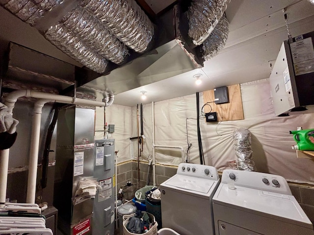 1020 7th Ave NW, Rice, MN 56367 - washroom with washer and clothes dryer and water heater