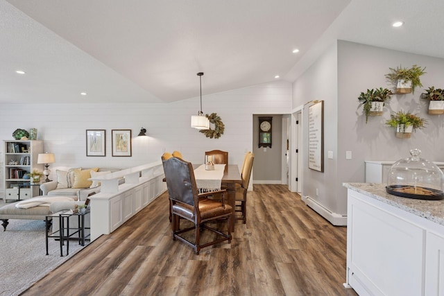 1811 Pulaski Rd, Buffalo, MN 55313 - dining room with dark wood-type flooring, vaulted ceiling, a baseboard radiator, recessed lighting, and wood walls