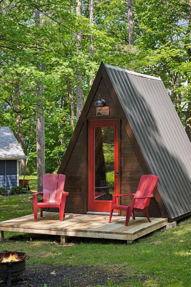 1811 Pulaski Rd, Buffalo, MN 55313 - view of outdoor structure featuring an outdoor fire pit