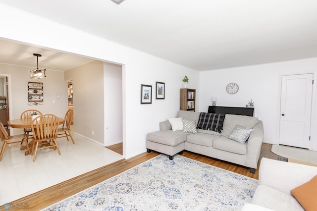 1633 1st St N, Fargo, ND 58102 - living area featuring wood finished floors and baseboards