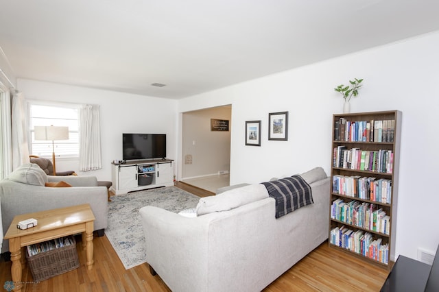 1633 1st St N, Fargo, ND 58102 - living room featuring light wood-style floors