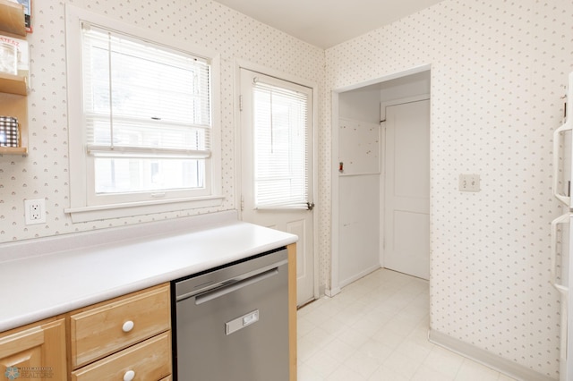 1633 1st St N, Fargo, ND 58102 - kitchen with dishwasher, wallpapered walls, light countertops, light brown cabinets, and light flooring