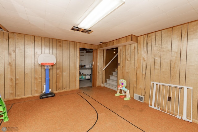 1633 1st St N, Fargo, ND 58102 - rec room featuring wooden walls and carpet