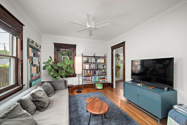 1144 Abell St, Saint Paul, MN 55117 - living room featuring crown molding, wood finished floors, and ceiling fan