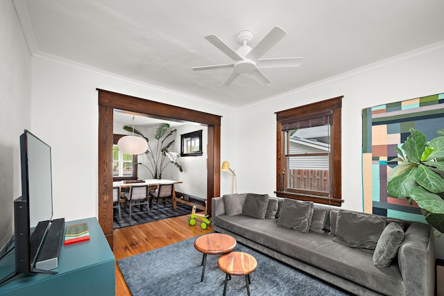 1144 Abell St, Saint Paul, MN 55117 - living area with wood finished floors, ornamental molding, ceiling fan, and baseboards