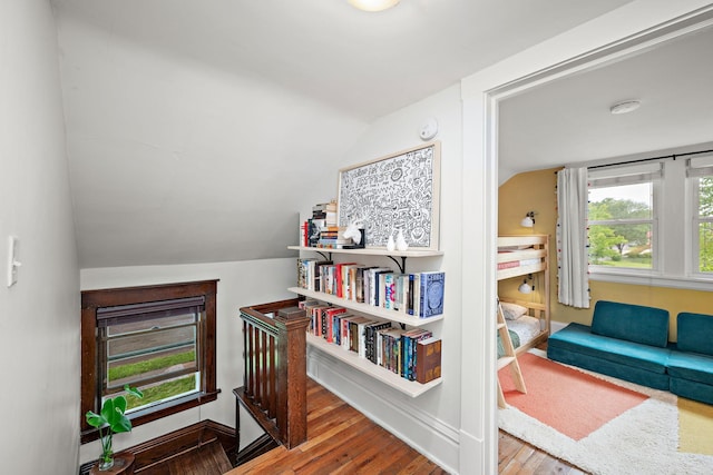 1144 Abell St, Saint Paul, MN 55117 - sitting room featuring vaulted ceiling, wood finished floors, and baseboards