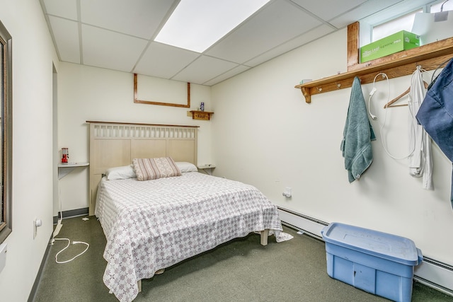 266 Janice St, Shoreview, MN 55126 - bedroom with baseboard heating, a drop ceiling, and carpet flooring