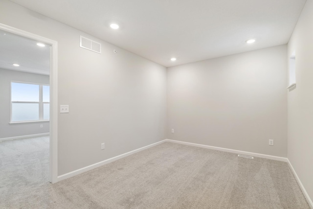 6687 Bluestem Way, Minnetrista, MN 55331 - empty room featuring carpet, recessed lighting, and baseboards