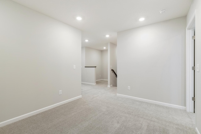 6687 Bluestem Way, Minnetrista, MN 55331 - empty room featuring recessed lighting, light colored carpet, and baseboards