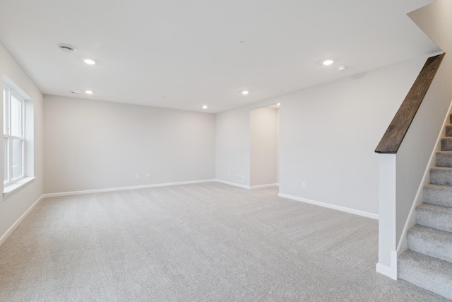 6687 Bluestem Way, Minnetrista, MN 55331 - basement with stairway, light carpet, recessed lighting, and baseboards