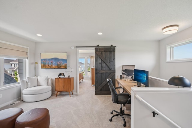 16149 Duvane Way, Lakeville, MN 55044 - office featuring light colored carpet, a barn door, and recessed lighting