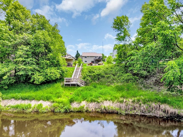 1217 Blossom Blvd NW, Isanti, MN 55040 - view of yard featuring a water view and stairs