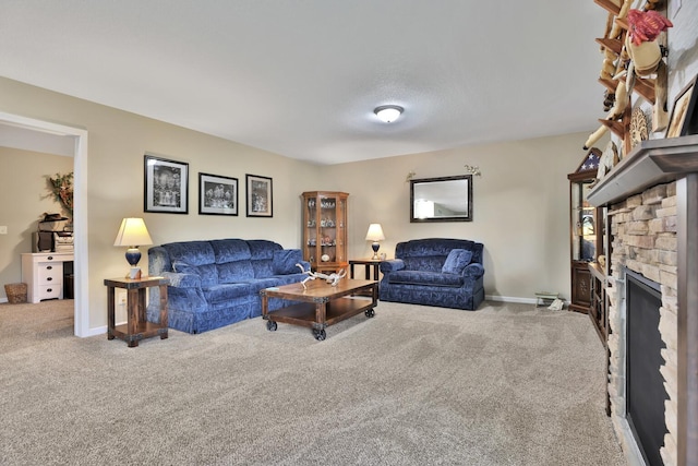 1217 Blossom Blvd NW, Isanti, MN 55040 - carpeted living room featuring a fireplace and baseboards