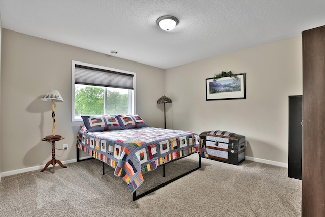 1217 Blossom Blvd NW, Isanti, MN 55040 - carpeted bedroom featuring baseboards and a textured ceiling
