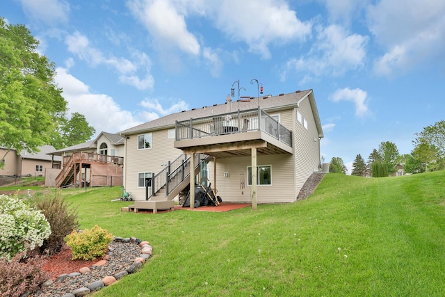1217 Blossom Blvd NW, Isanti, MN 55040 - back of property featuring stairs, a wooden deck, and a yard