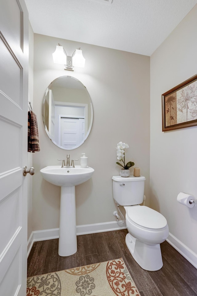14246 Wilds Dr NW, Prior Lake, MN 55372 - bathroom with wood finished floors and toilet
