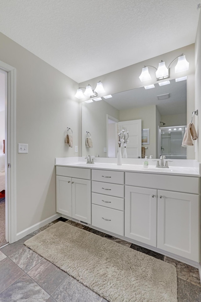 14246 Wilds Dr NW, Prior Lake, MN 55372 - full bathroom with double vanity and an enclosed shower