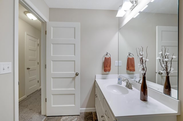 14246 Wilds Dr NW, Prior Lake, MN 55372 - bathroom featuring vanity and baseboards